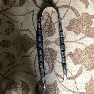 Black leather and silver snakeskin belt